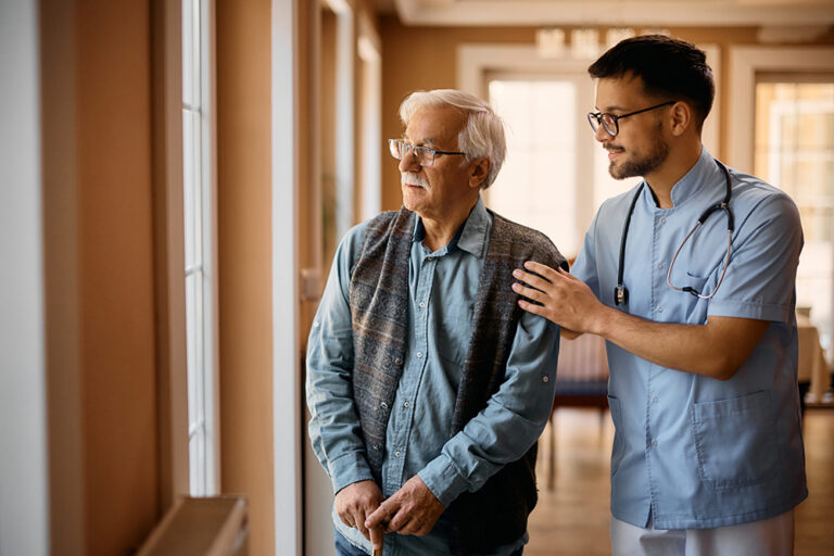 A patient being comforted by a nurse.