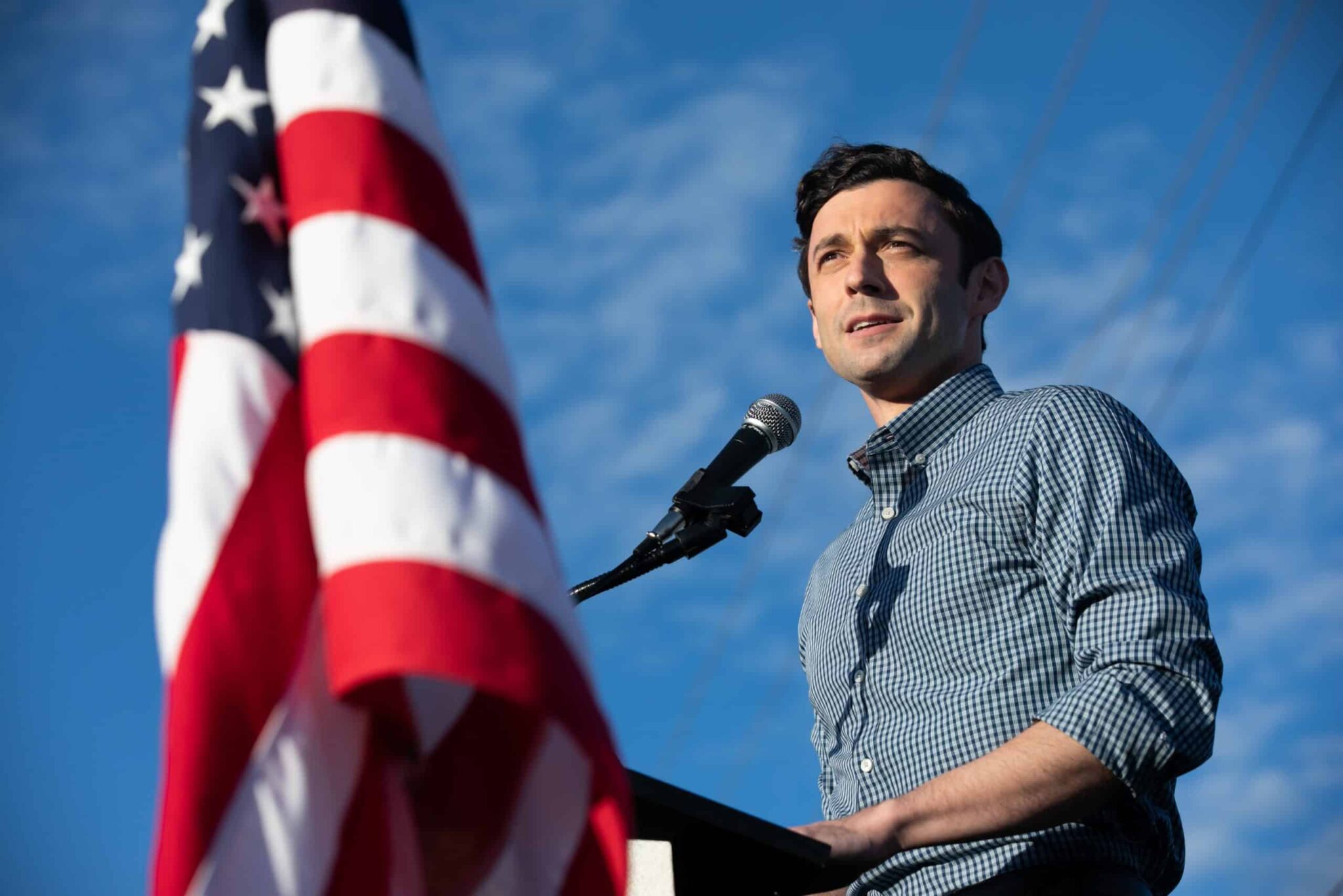 Senator Ossoff giving a speech at a podium